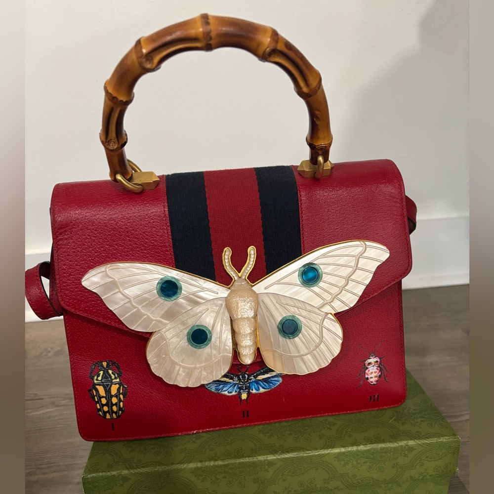 Red Women’s Top-Handle Bag with Bamboo Handle and Moth Detail